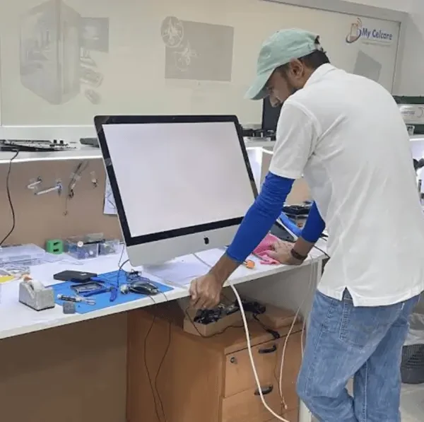 Replacement parts on the workbench at the My Celcare JLT store in Dubai